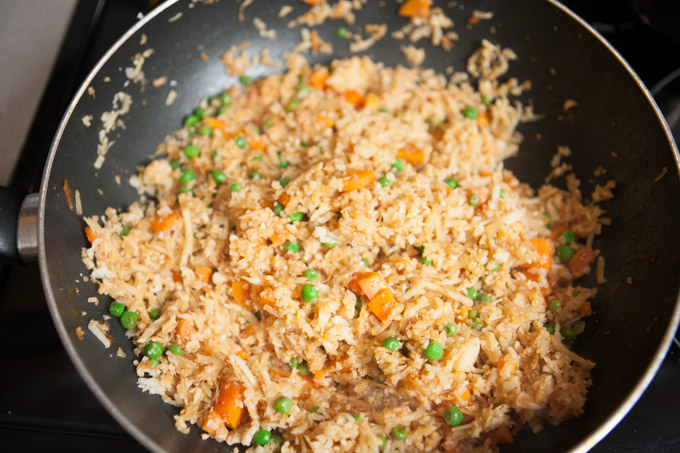 Fry the rice until it becomes slightly brown